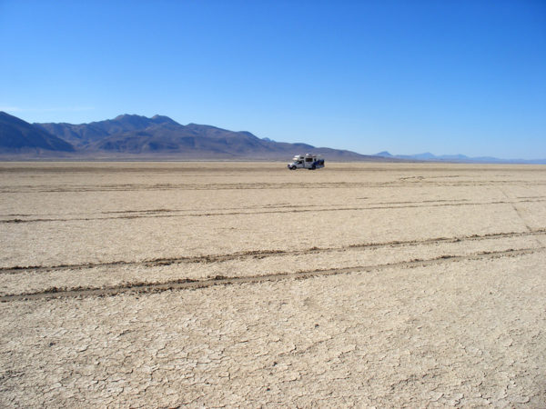 Black Rock Desert with an RV driving by.